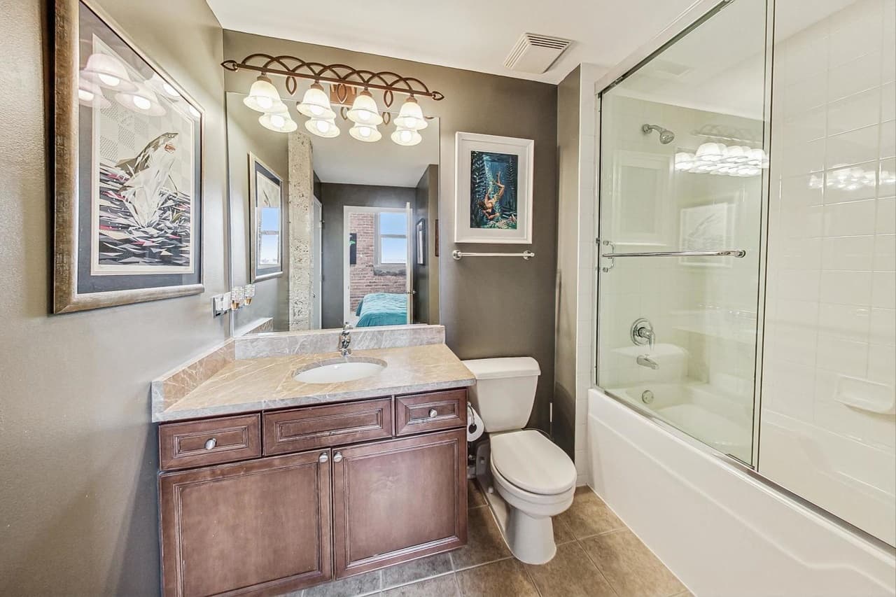 The second bath with tub and shower